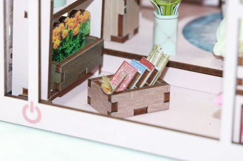 Book Nook - Mini Greenhouse Flower Room dekorativ auf einem Schreibtisch platziert