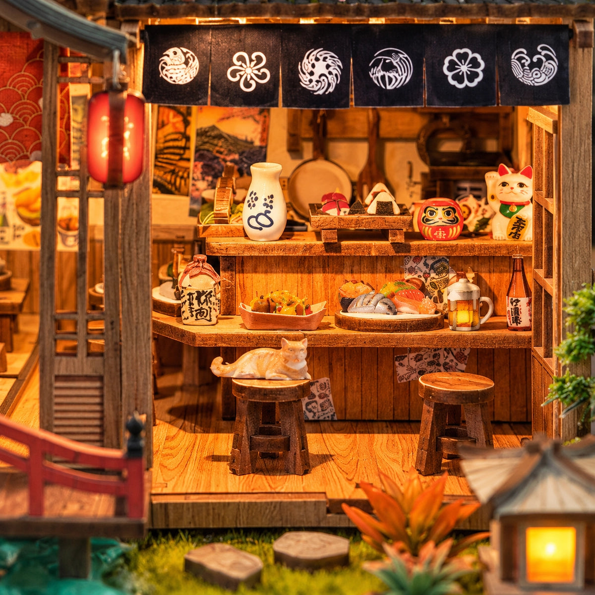 Close view of the eatery with dishes, stools and a lucky cat