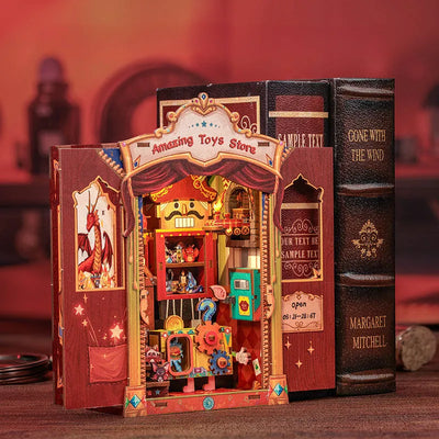 Amazing Toys Store aperto accanto ai libri con miniature e telefono turchese