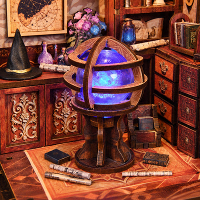 Arcanum Bookstore – Sfera viola e blu fra libri e rotoli
