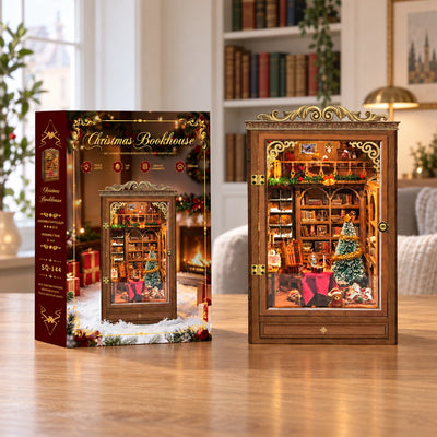Christmas Book House neben seiner Verpackung