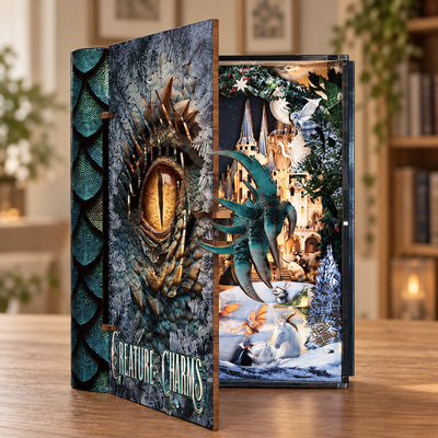 Creature Charms mit halb geöffnetem Drachenauge-Buchdeckel