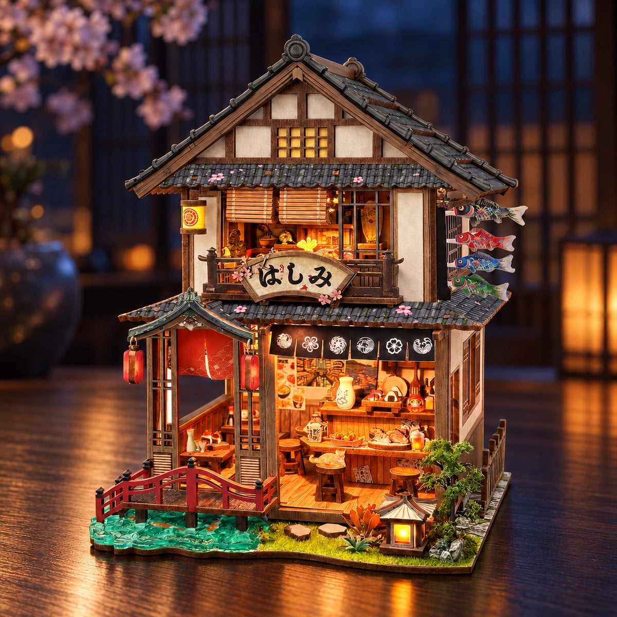 Bridgeside Machiya with a red bridge and illuminated shop-house