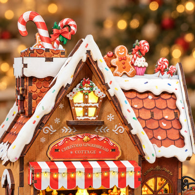 Dach mit Lebkuchenmann, Zuckerstangen und Zuckergussoptik