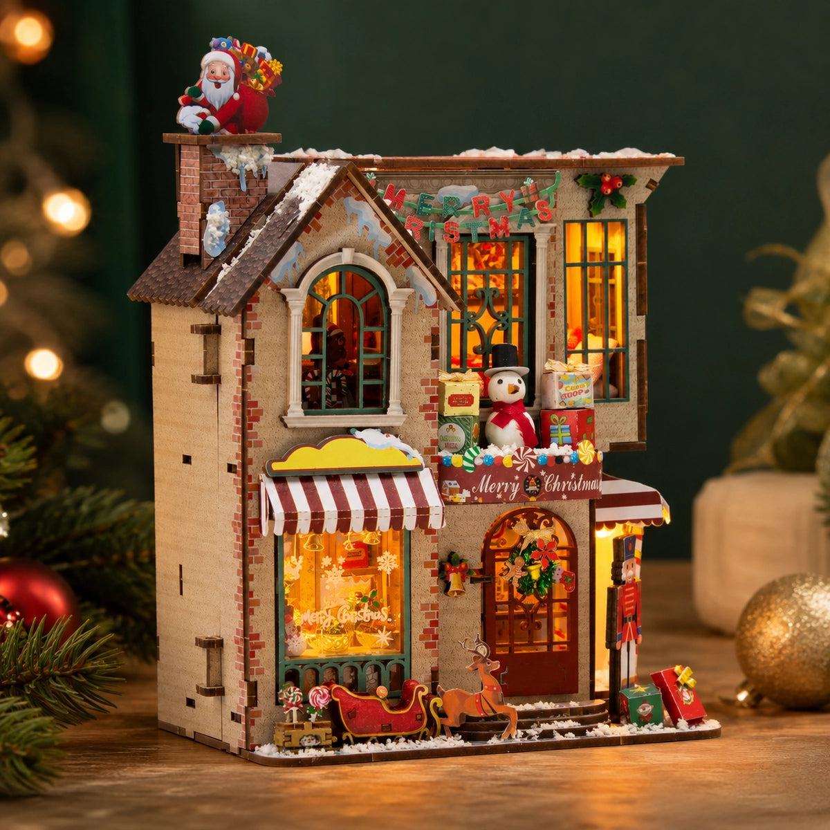 Enchanted Christmas Cottage con interni e luci visibili