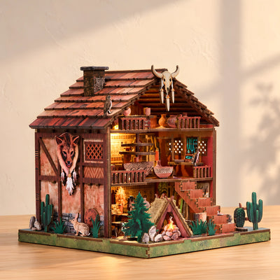 Widok boku miniaturowego domu z motywem lisa i otwartym przodem