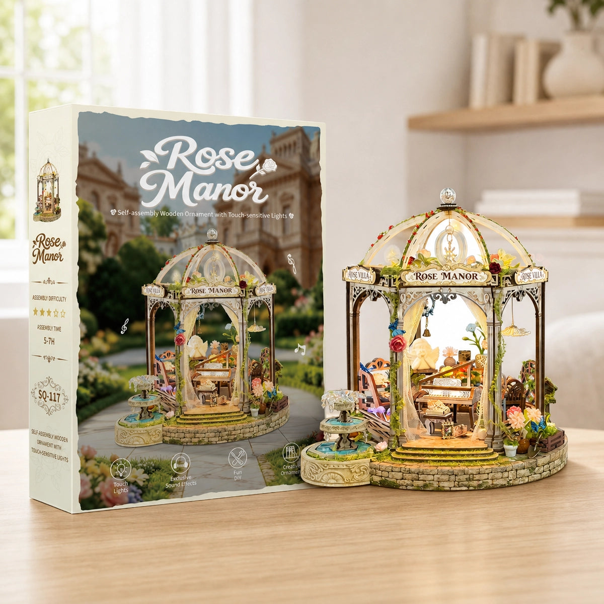 Kit Rose Manor accanto alla confezione regalo illustrata