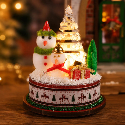 Schneemann-Spieluhr mit beleuchtetem Winterbaum und Geschenk