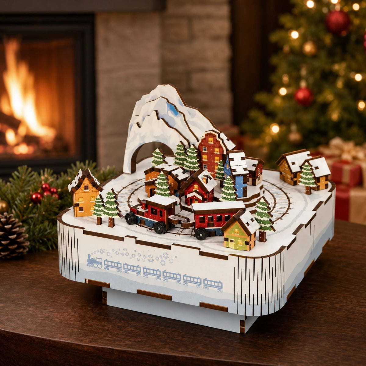 Snow Train accanto al camino e all’albero di Natale